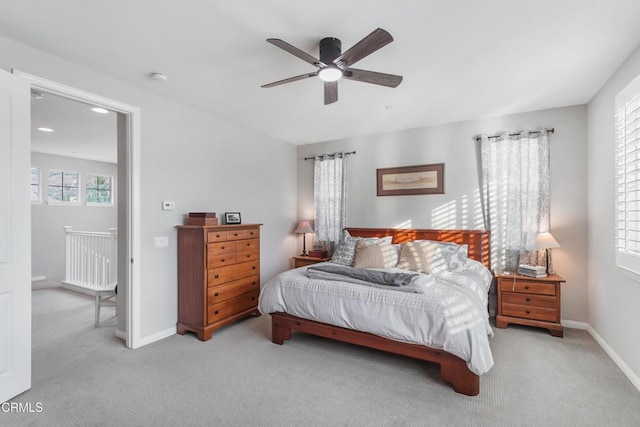 carpeted bedroom featuring ceiling fan