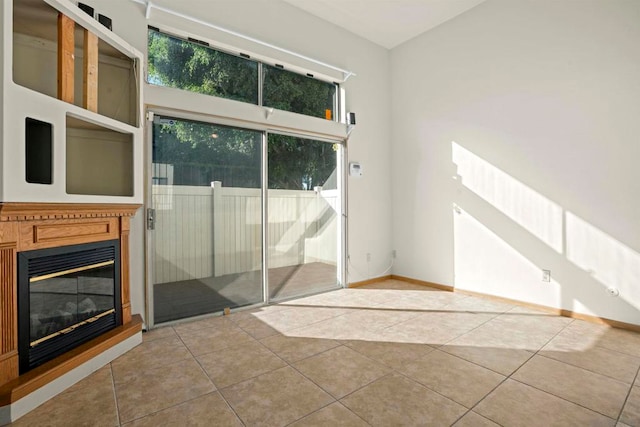 interior space with tile patterned flooring and plenty of natural light