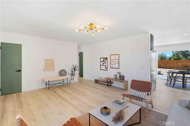 62044 Valley View Cir, Joshua Tree, CA 92252 - living room featuring a chandelier and wood finished floors