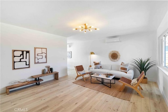 62044 Valley View Cir, Joshua Tree, CA 92252 - living area with an AC wall unit, wood finished floors, and a chandelier