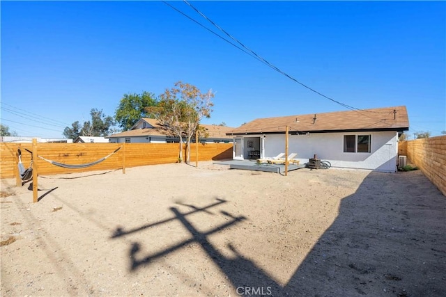 62044 Valley View Cir, Joshua Tree, CA 92252 - back of house featuring a fenced backyard and stucco siding