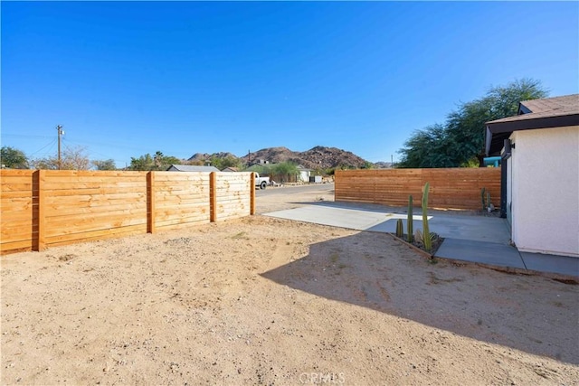 62044 Valley View Cir, Joshua Tree, CA 92252 - view of yard with a mountain view and a patio area