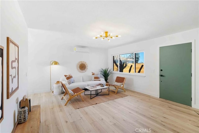 62044 Valley View Cir, Joshua Tree, CA 92252 - living area featuring a wall unit AC, wood finished floors, and a chandelier