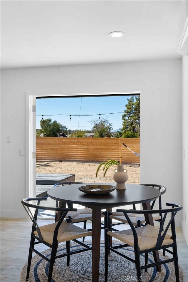 62044 Valley View Cir, Joshua Tree, CA 92252 - dining area with plenty of natural light, light wood-style flooring, and recessed lighting