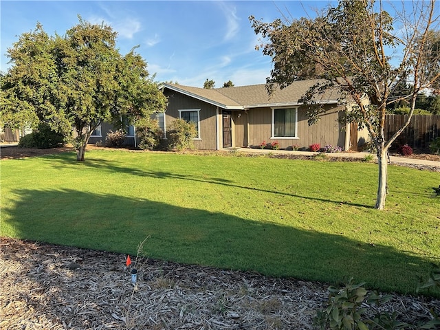 view of front of house with a front lawn