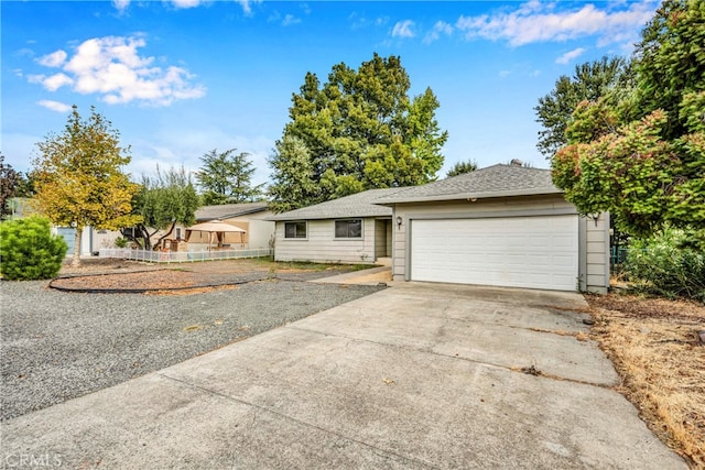 ranch-style home featuring a garage