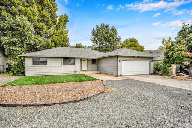 ranch-style home with a garage