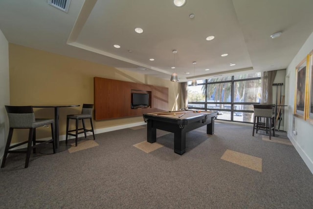 playroom with dark carpet, billiards, and a tray ceiling