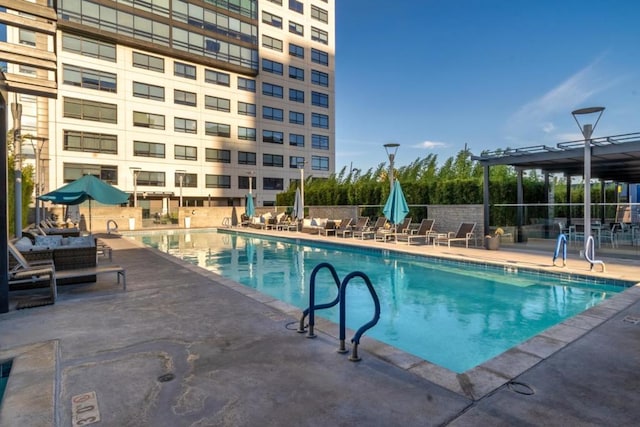 view of swimming pool featuring a patio