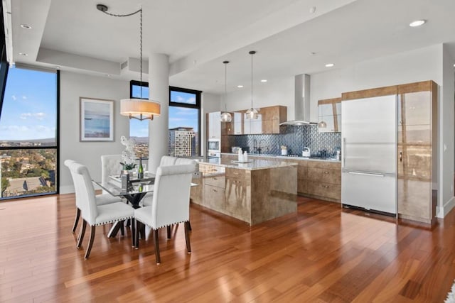 dining area featuring hardwood / wood-style floors