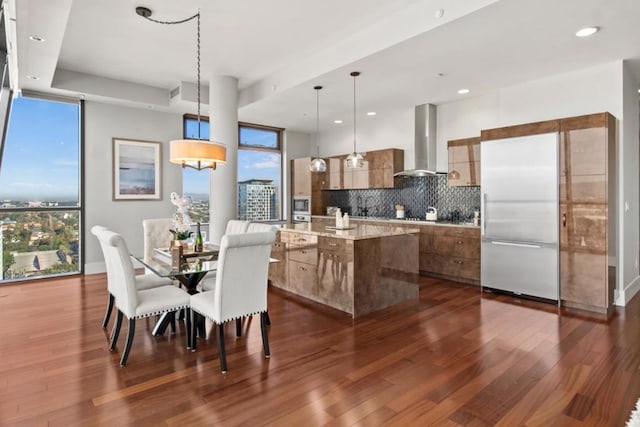 dining area featuring dark hardwood / wood-style flooring