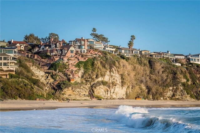 property view of water featuring a view of the beach