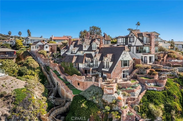 birds eye view of property with a residential view