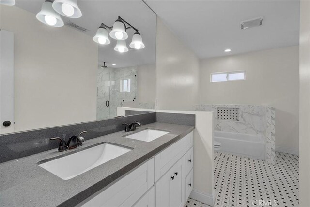 full bathroom with plus walk in shower, vanity, and toilet