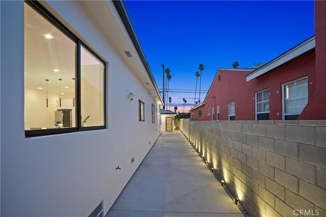 view of property exterior at dusk