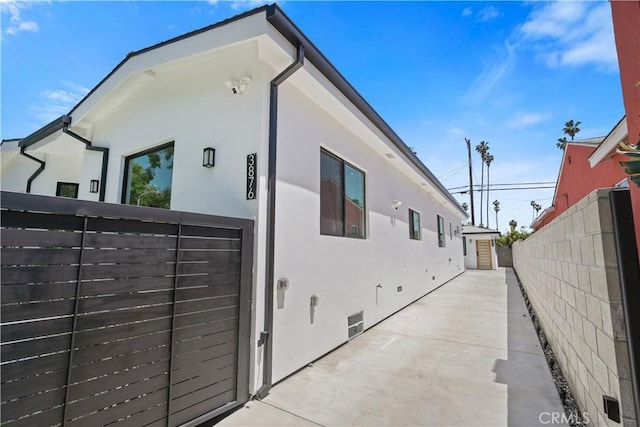 view of home's exterior with a patio