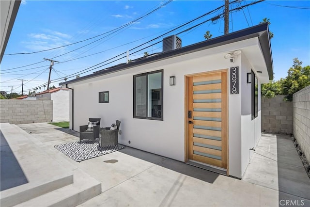 rear view of house featuring a patio area