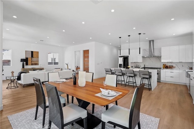 dining room featuring light hardwood / wood-style floors