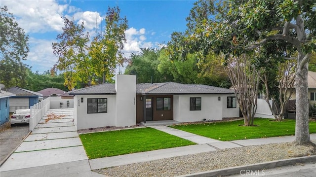 view of front of property with a front lawn