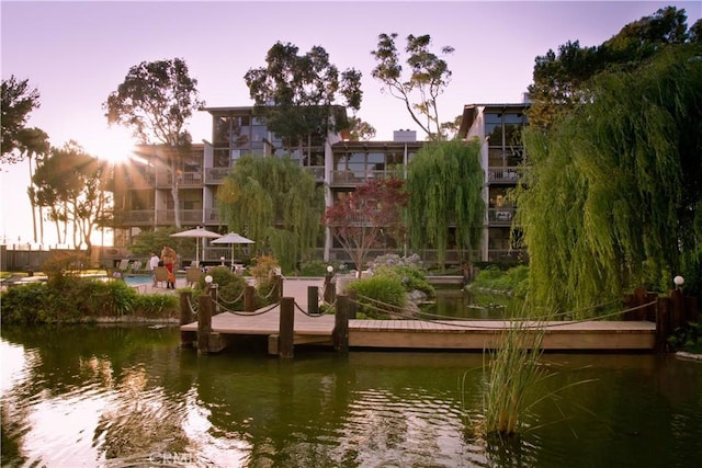 surrounding community featuring a water view