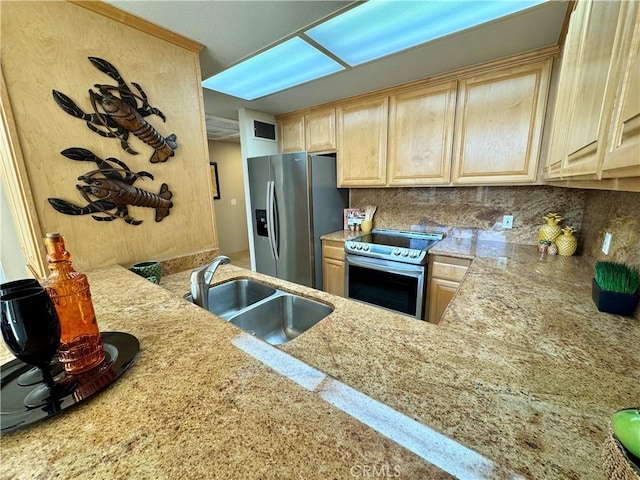 kitchen featuring stainless steel appliances, tasteful backsplash, sink, and light brown cabinetry