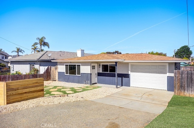 ranch-style house with a garage