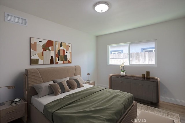 bedroom featuring hardwood / wood-style flooring