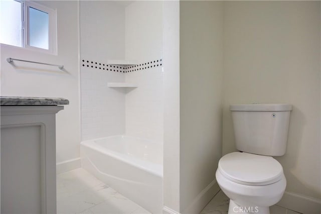 bathroom featuring  shower combination and toilet