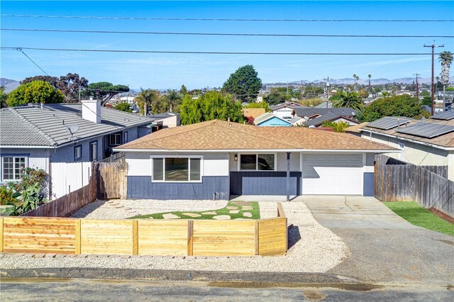 single story home with a garage