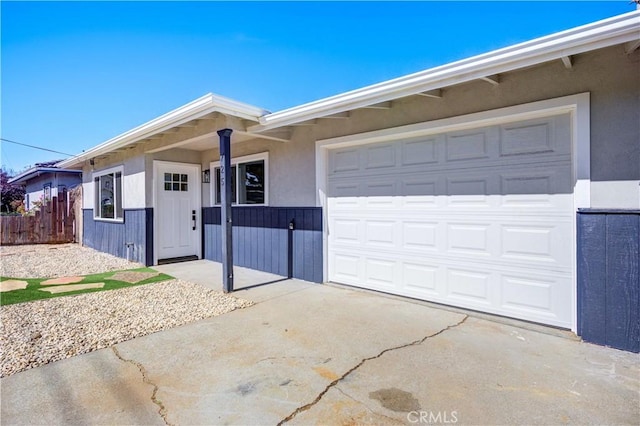 ranch-style house featuring a garage