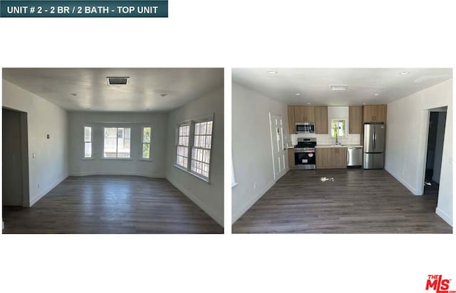 interior space featuring sink, dark hardwood / wood-style flooring, and stainless steel appliances