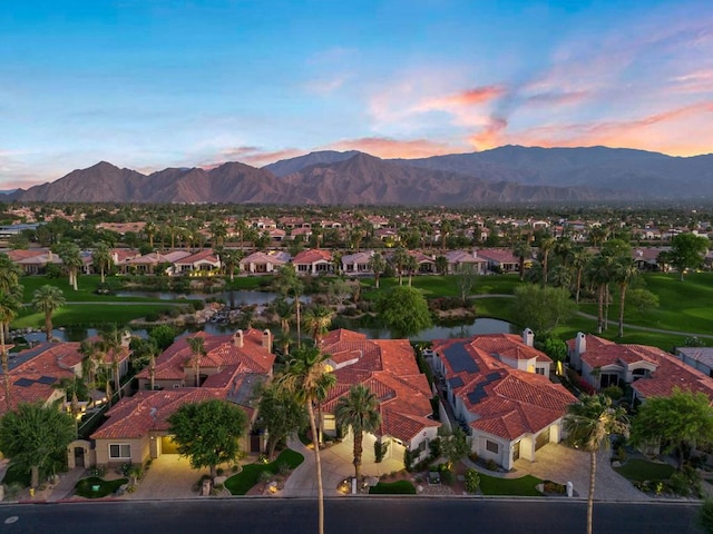 aerial view at dusk with a mountain view