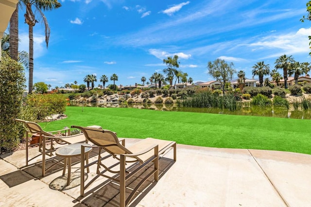 view of patio featuring a water view