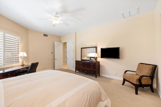 bedroom with light carpet and ceiling fan