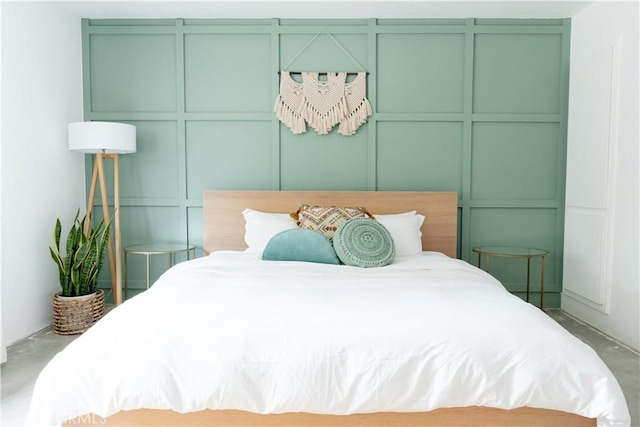 bedroom with concrete flooring