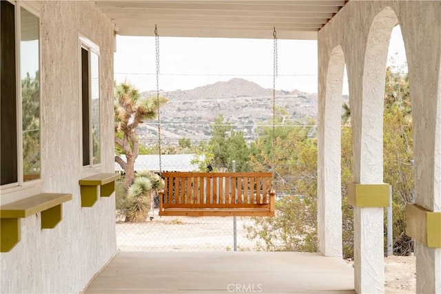 exterior space with a mountain view and a healthy amount of sunlight