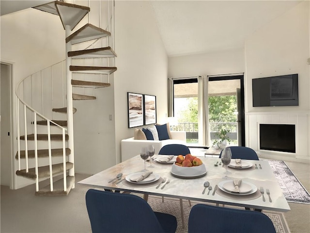 dining room featuring lofted ceiling