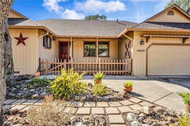 ranch-style home with a garage