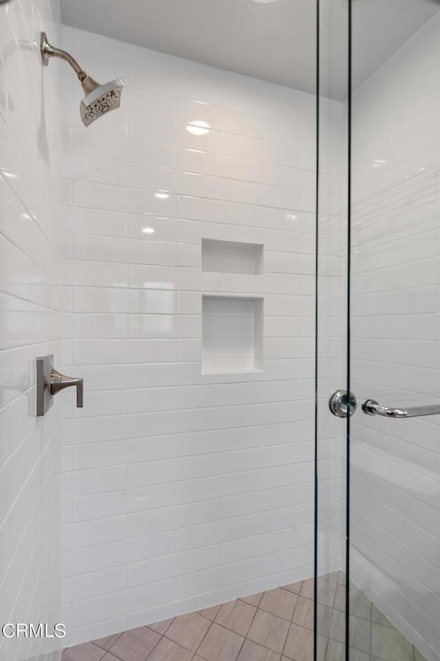 full bath featuring a stall shower