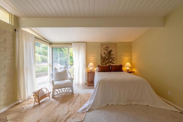 unfurnished bedroom with beam ceiling