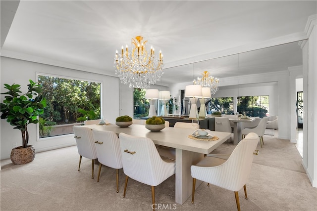 carpeted dining area with crown molding, a chandelier, and a wealth of natural light