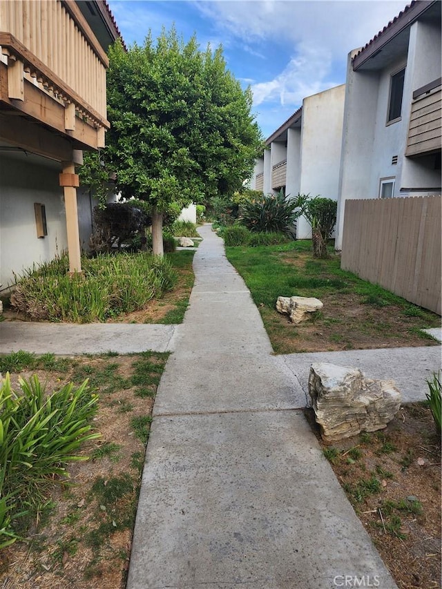view of property's community with fence