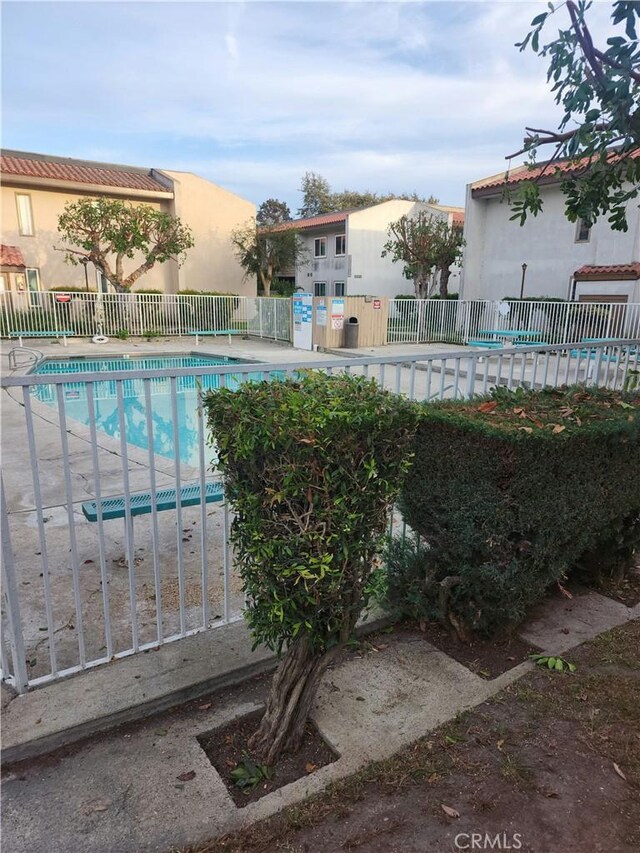 community pool with fence