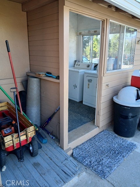 1352 Jasper Ave, Mentone, CA 92359 - bathroom with wood walls and washer and dryer