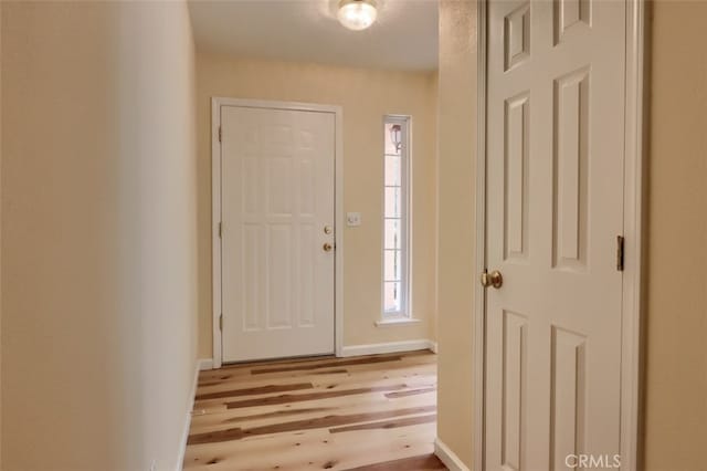 doorway featuring light wood-type flooring