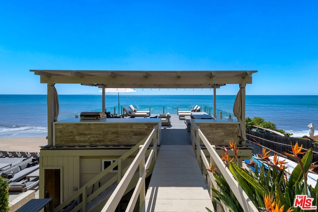 exterior space featuring a beach view