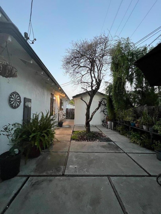 view of property exterior featuring an outdoor structure