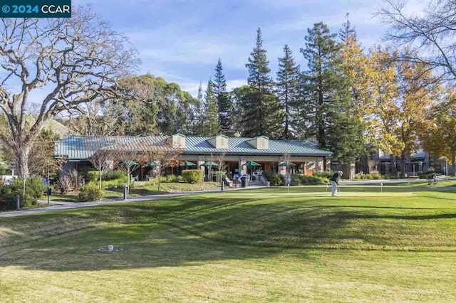 view of community featuring a yard