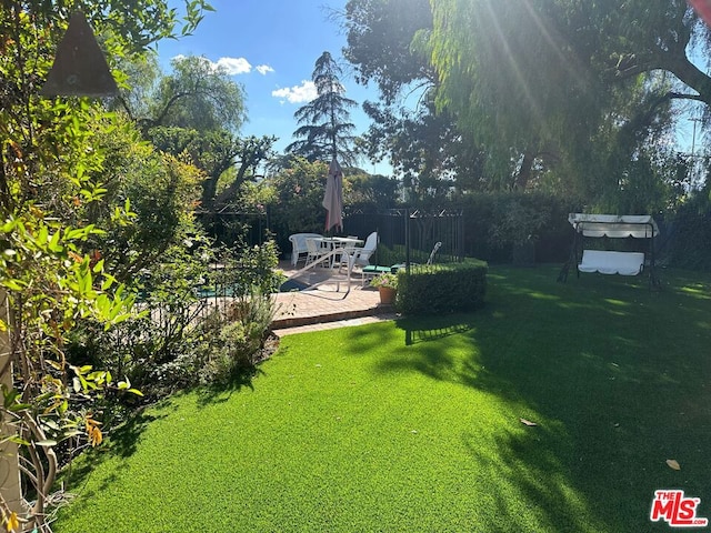 view of yard with a patio area