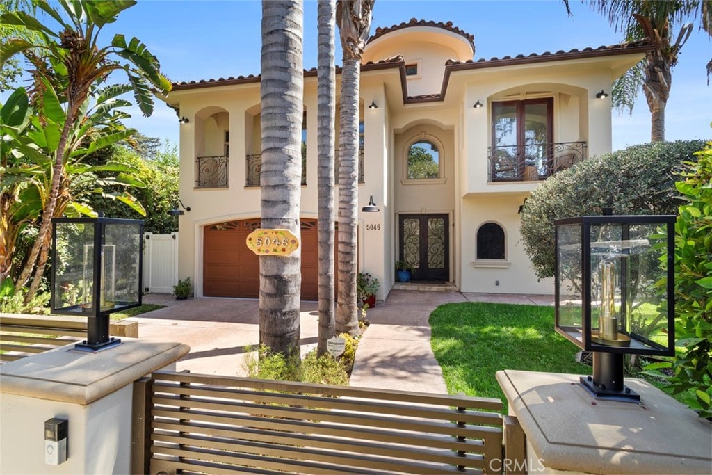 mediterranean / spanish-style house featuring a garage